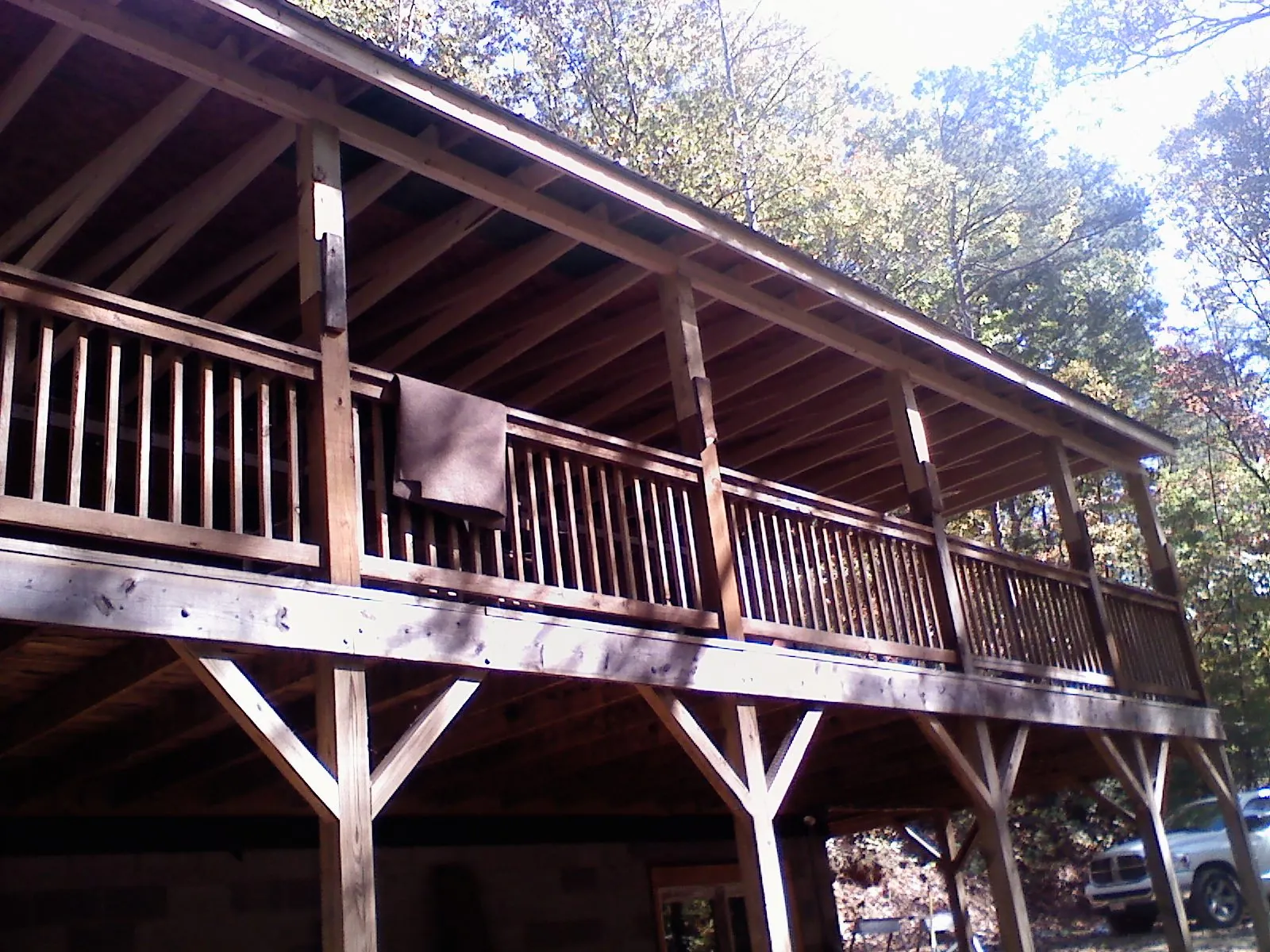 Timber framing under a new elevated porch and deck — Roof Leak Repair in South Glens Falls by Roofing Brothers